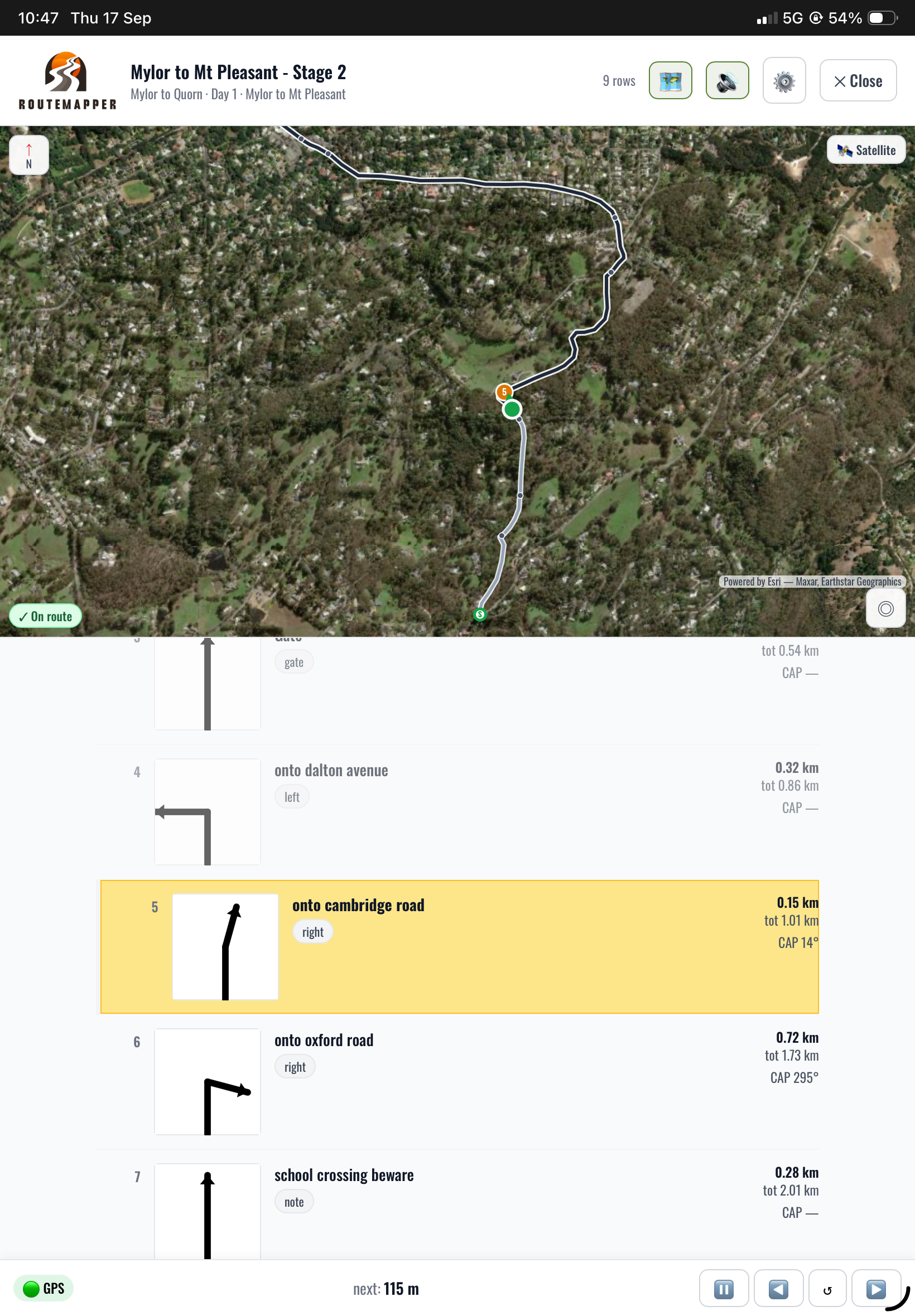 Travel Mode navigating live on satellite imagery — on route, roadbook advancing